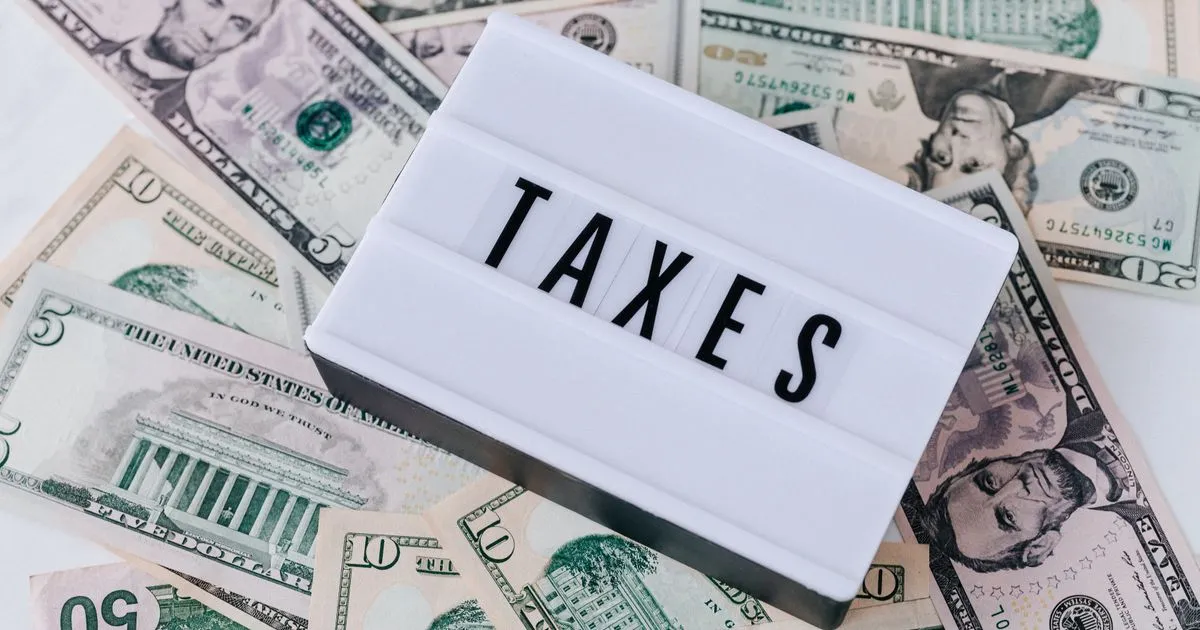 A US founder reviewing payroll tax notices and contractor agreements