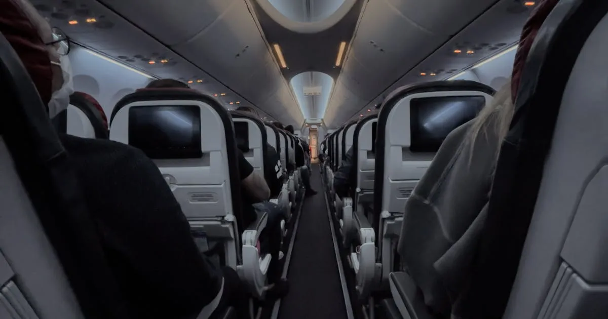 Passengers in an airplane cabin, leave travel allowance journey